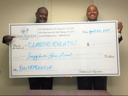 Ralph Watson and Frank Walker Pose with the Donation Check